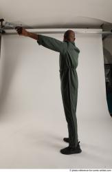 ERIC PILOT STANDING POSE WITH GUNS